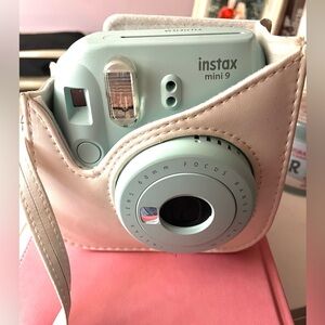Instax mini 9 Polaroid camera (Fujifilm). Light Blue and comes with white case!